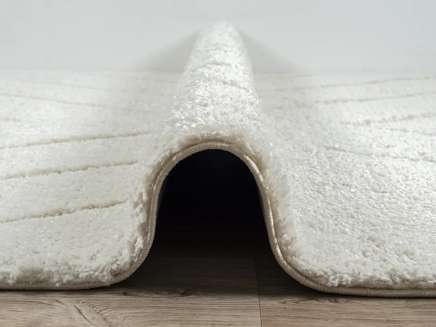 Alfombra Bahar Shaggy patrón triángulos, crema, 120 cm redonda
