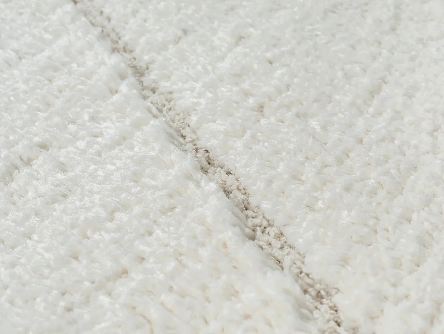 Alfombra Bahar Shaggy patrón triángulos, crema, 120 cm redonda