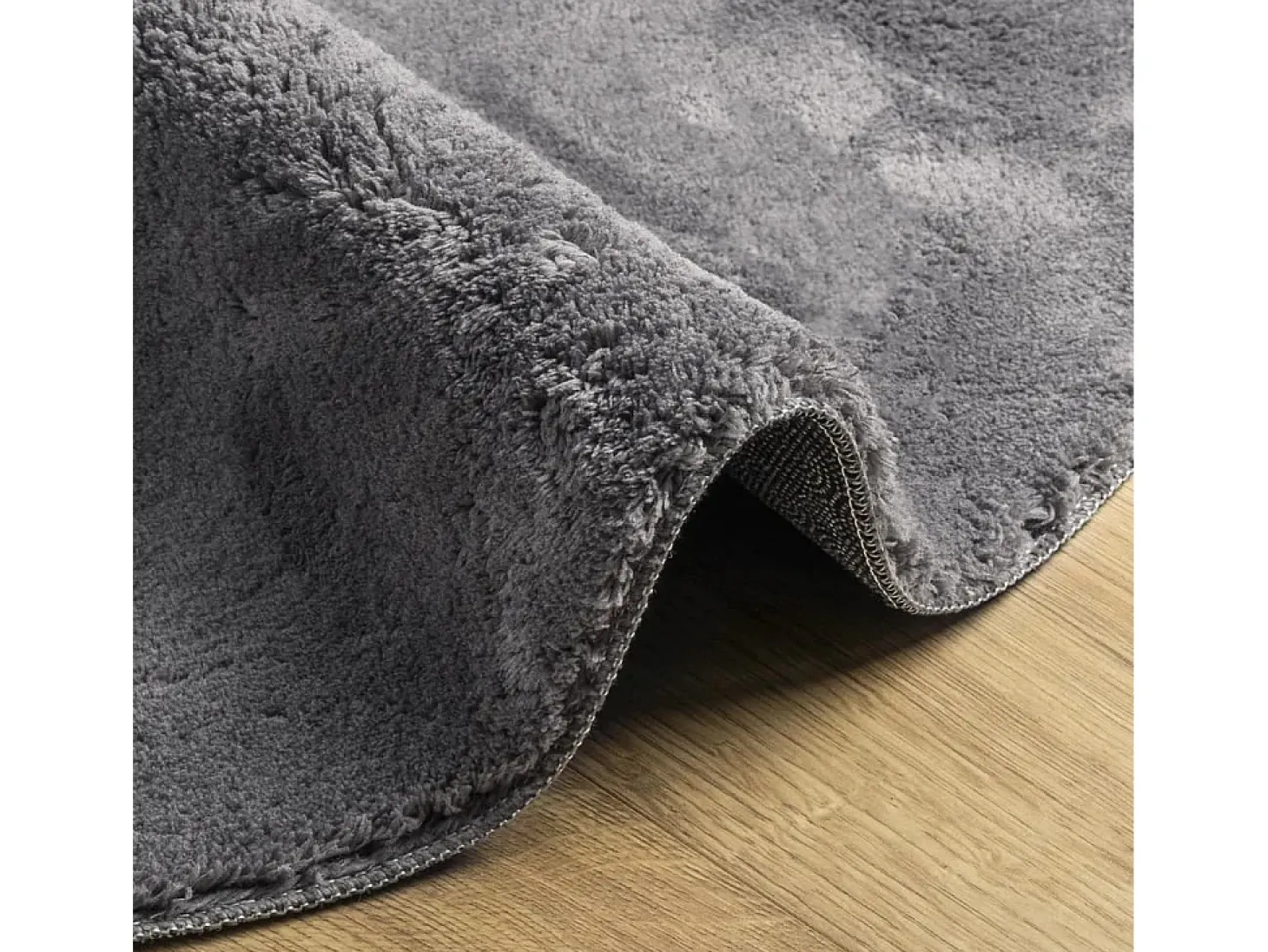 Alfombra HUARTE de pelo corto suave y lavable en color antracita Ø 160 cm