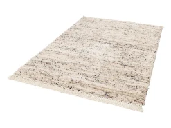 Alfombra interior con patrón moteado crema