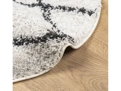 Alfombra moderna de pelo largo en color crema y negro, Ø 100 cm