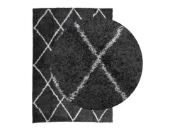 Alfombra moderna de pelo largo en color negro y crema de 140 x 200 cm