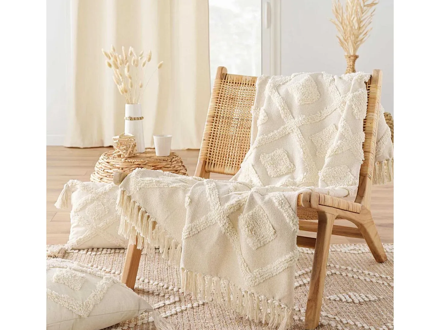 Manta tufted con borlas